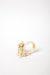 Figural napkin ring, with reclining girl.